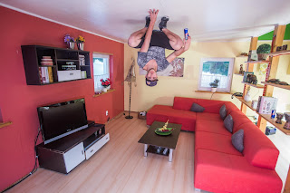 Jason Paul Running Illusion house up-side-down (c) Emily Dyan Ibarra.jpg